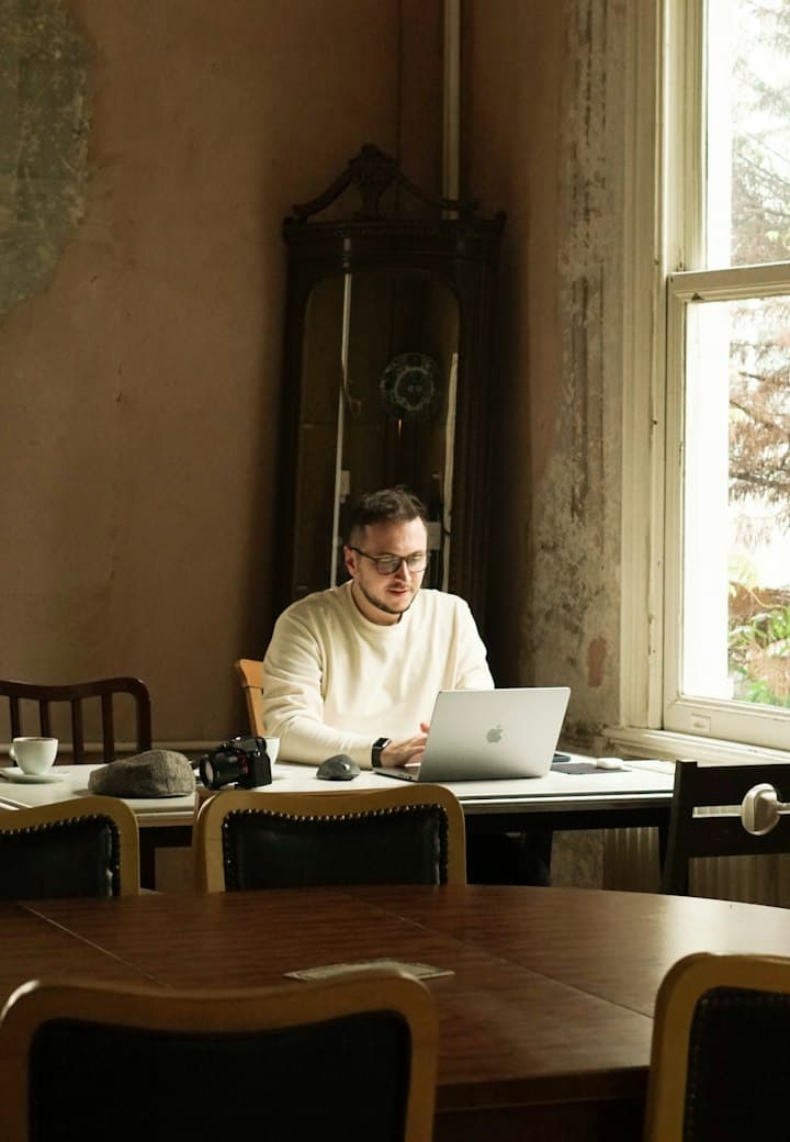 Digital marketer working on an SEO strategy at a laptop