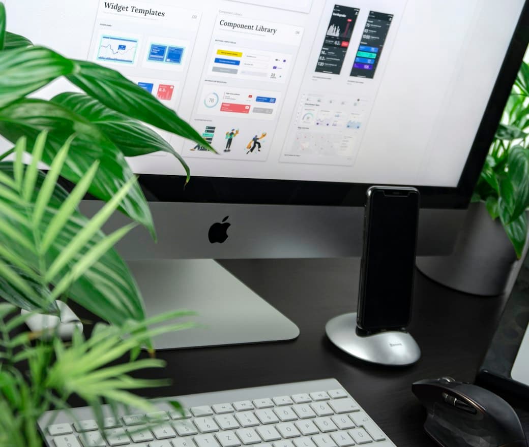 Website design and development on a desktop monitor