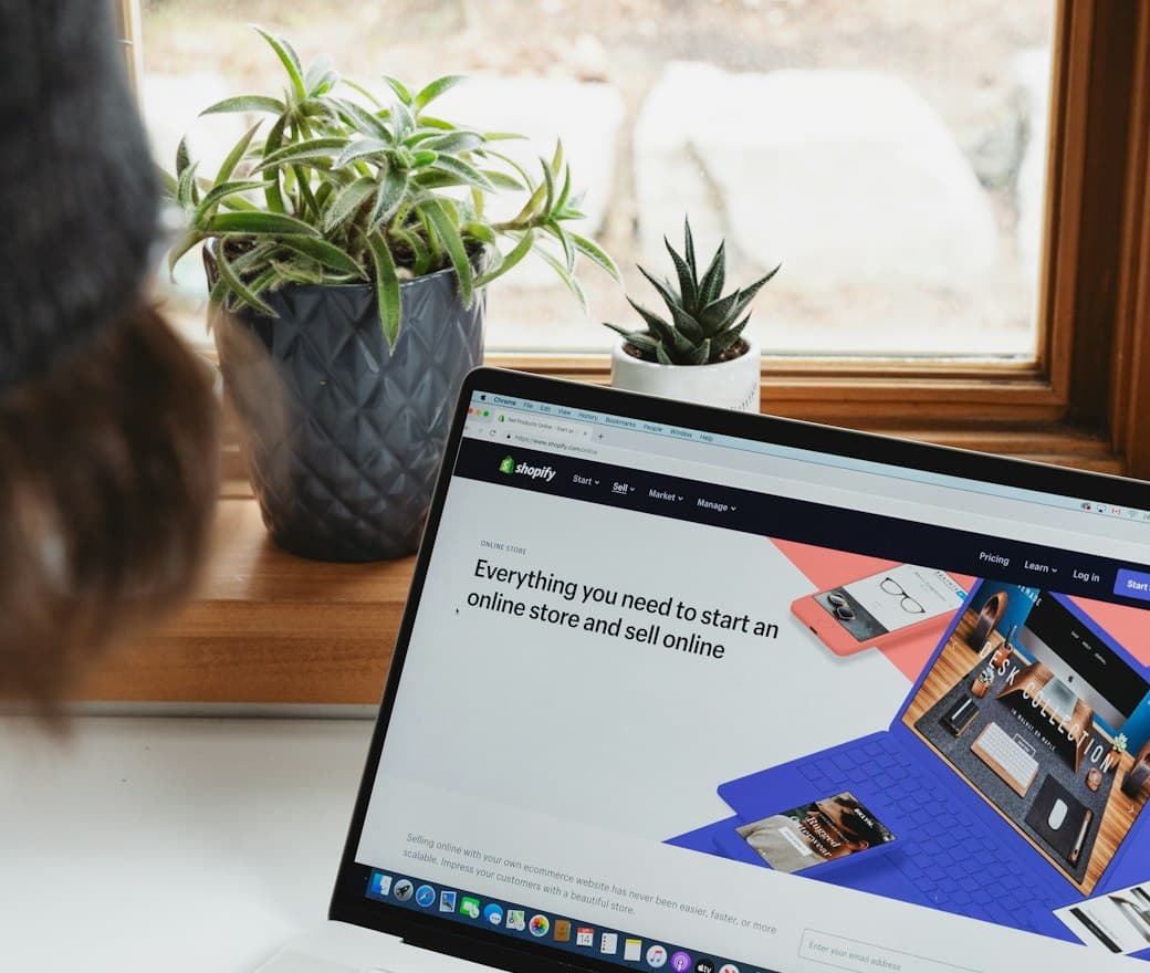 Managing a PPC advertising campaign on a laptop